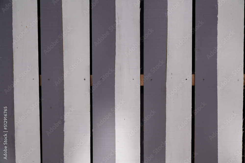 Wood vertical background wooden construction old planks white and gray beach fence Wood vertical background wooden construction old planks white and gray beach fence