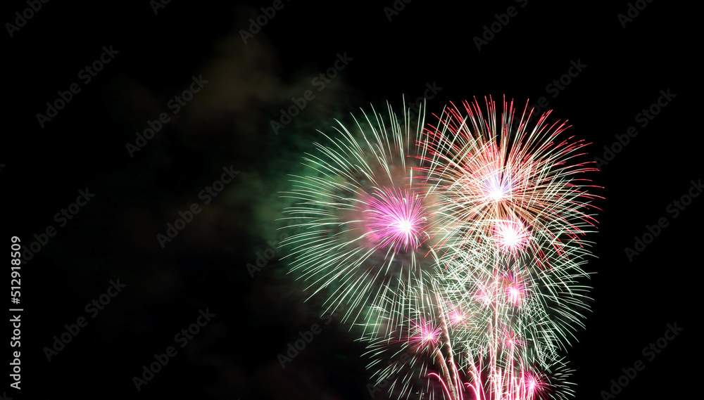 Spectacular coorful fireworks splashing in the night sky