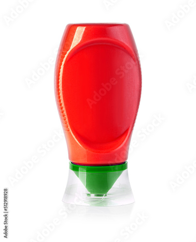 red plastic ketchup bottle isolated