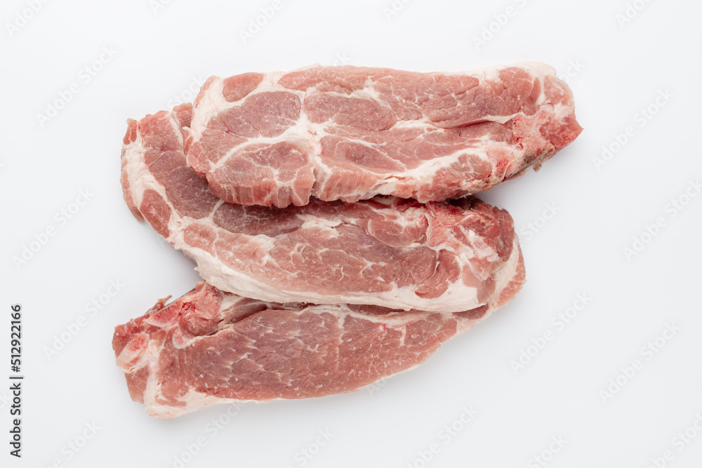 Piece of pork meat isolated on white background. Piece of pork meat isolated on white background.