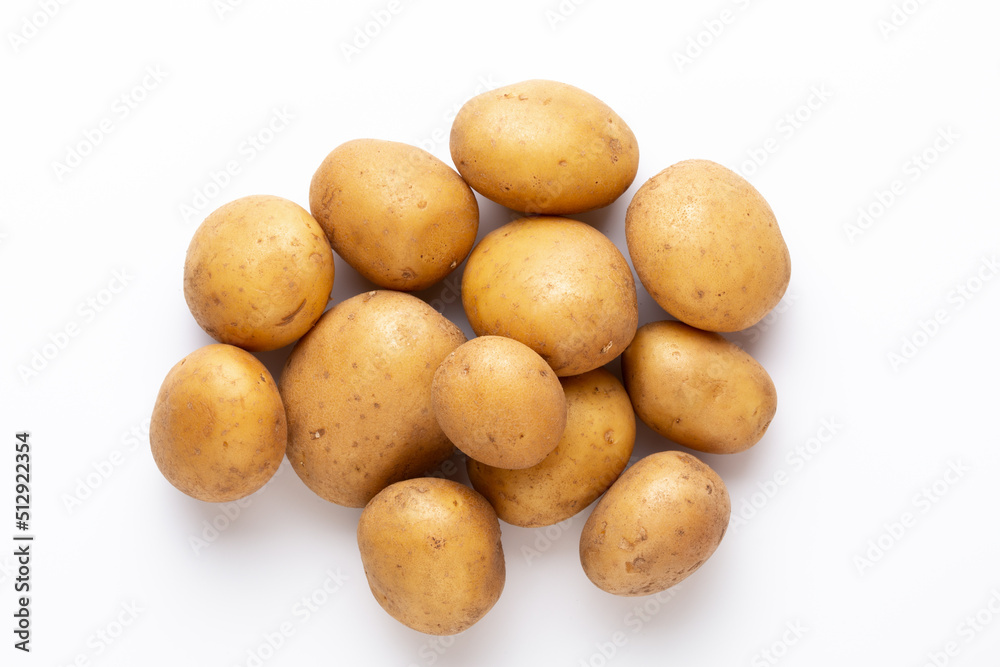 Potatoes isolated on white background. Flat lay. Top view. Potatoes isolated on white background. Flat lay. Top view.