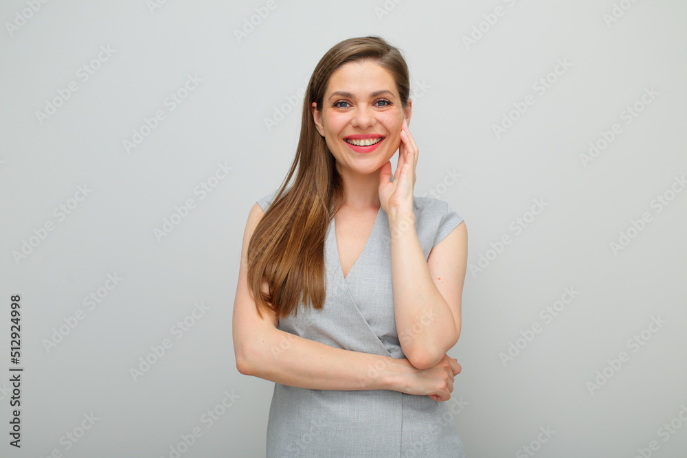 Happy smiling woman in gray business dress isolated portrait. Happy smiling woman in gray business dress isolated portrait.