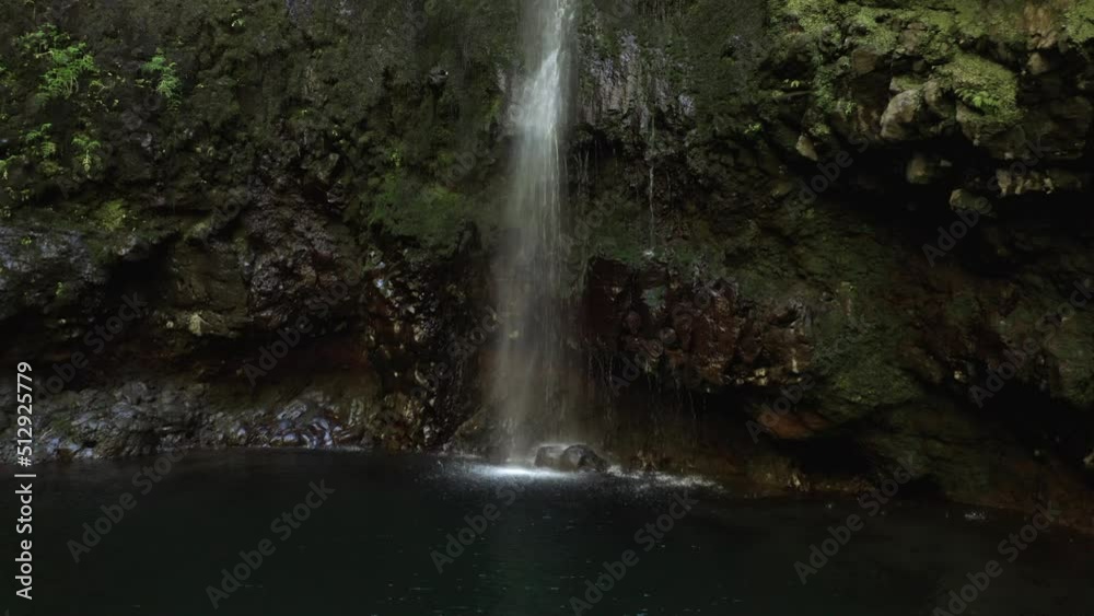 aerial forward of a waterfall in Madeira Caldeirao Verde aerial forward of a waterfall in Madeira Caldeirao Verde