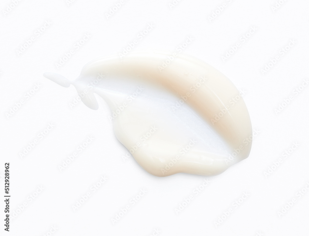 Naklejka premium White cream swipe isolated on white background.