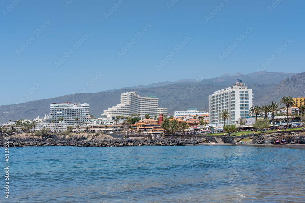 Calm and tranquil water bay surrounded by fabulous large hotels, in one of the most popular areas in the south of the island, at Playa de Troya, Costa Adeje, Tenerife, Canary Islands, Spain Calm and tranquil water bay surrounded by fabulous large hotels, in one of the most popular areas in the south of the island, at Playa de Troya, Costa Adeje, Tenerife, Canary Islands, Spain