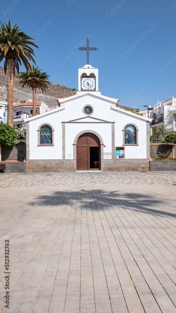 Charming Catholic Church of the Holy Spirit located right in the heart of the quaint village attended by locals on Sundays mass  and religious holidays, Los Gigantes, Tenerife, Canary Islands, Spain