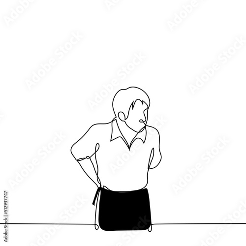 man tying a black apron on himself - one line drawing vector. concept an employee of a restaurant, catering or coffee shop gets dressed before a work shift