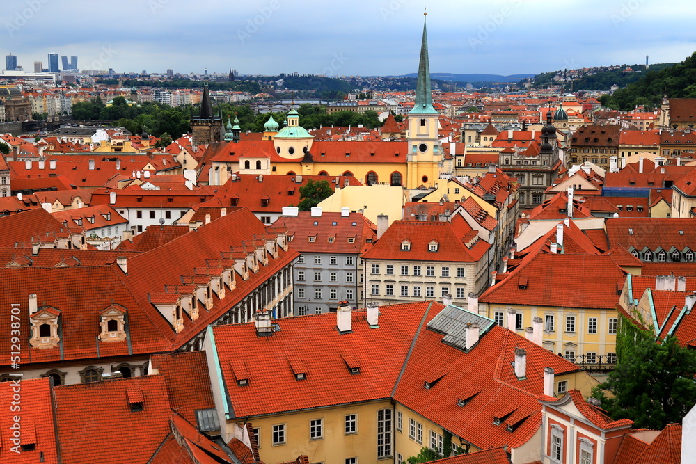 Prague, Czech Republic. Mala Strana, Lesser Town of Prague. Top view of downtown, panorama, old buildings with red tiled roofs, church, tower, castle