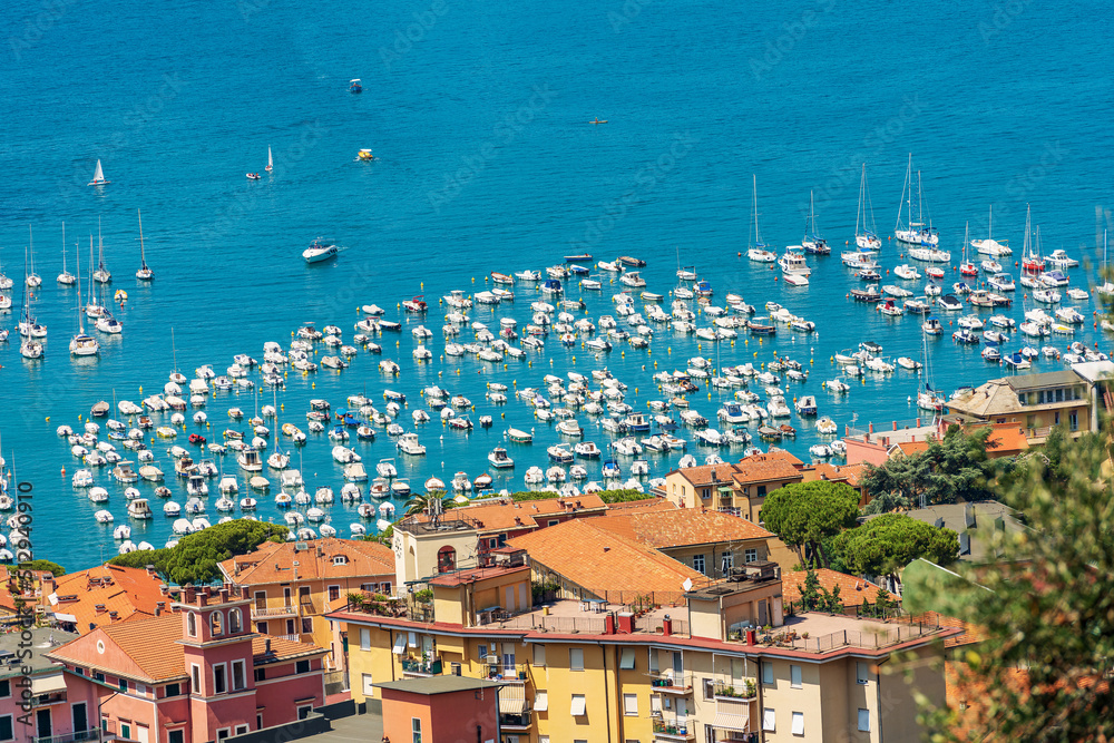 Aerial view of the port of Lerici town with many recreational boats moored, Tourist resort on the coast of Gulf of La Spezia, Liguria, Mediterranean sea (Ligurian Sea), Italy, Europe.
