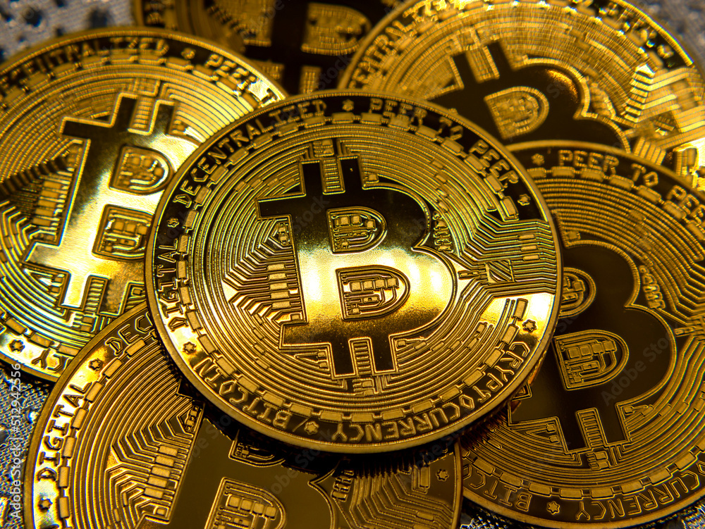 close-up shot group of golden metal coins Bitcoin