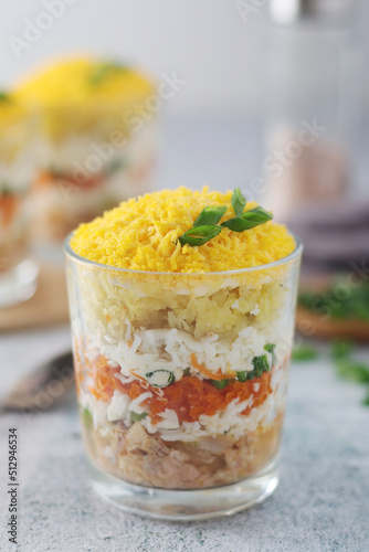 Mimosa salad in transparent glass	