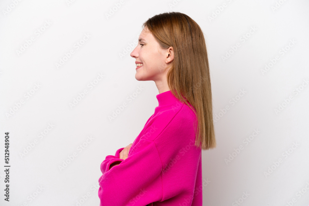 Young English woman isolated on white background in lateral position Young English woman isolated on white background in lateral position