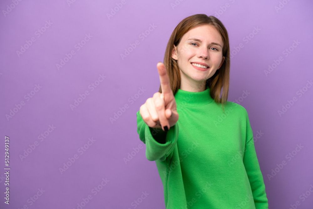 Young English woman isolated on purple background showing and lifting a finger Young English woman isolated on purple background showing and lifting a finger