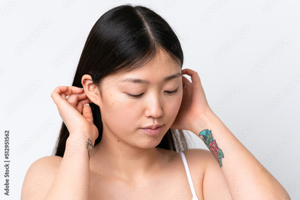 Young Chinese woman isolated on white background . Close up portrait Young Chinese woman isolated on white background . Close up portrait