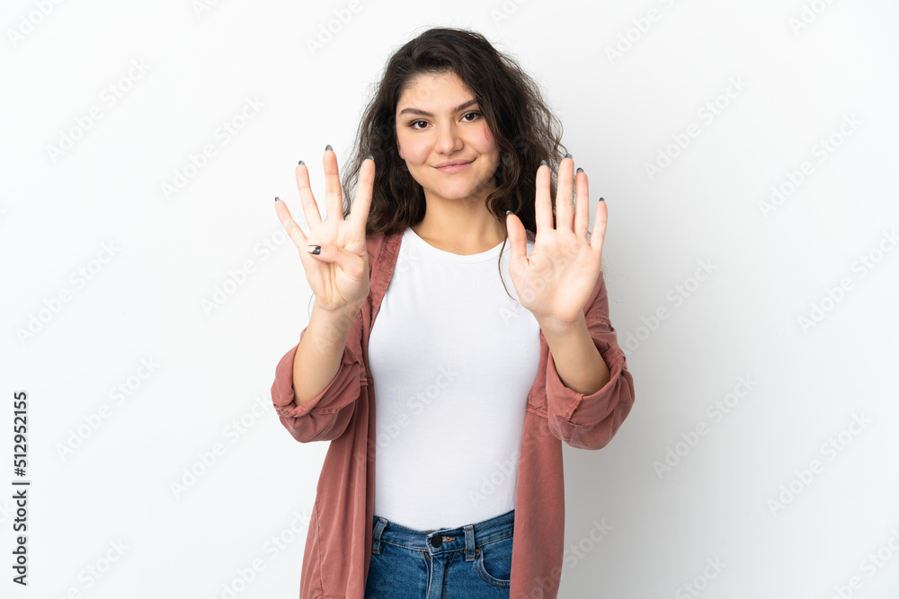 Teenager Russian girl isolated on white background counting nine with fingers Teenager Russian girl isolated on white background counting nine with fingers