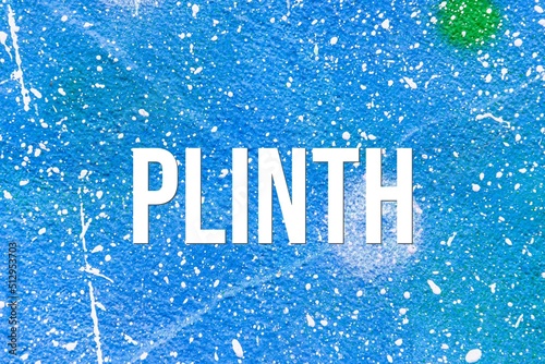 PLINTH - word on concrete background. Cement floor, wall.