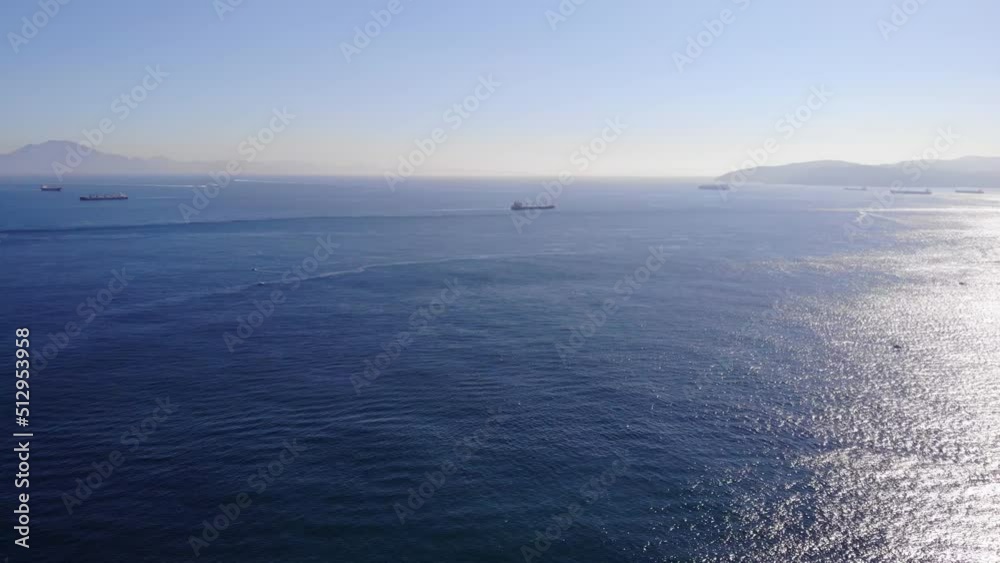 Aerial Pan Left View Of The Strait Of Gibraltar With Ships In Background. Establishing Shot Aerial Pan Left View Of The Strait Of Gibraltar With Ships In Background. Establishing Shot