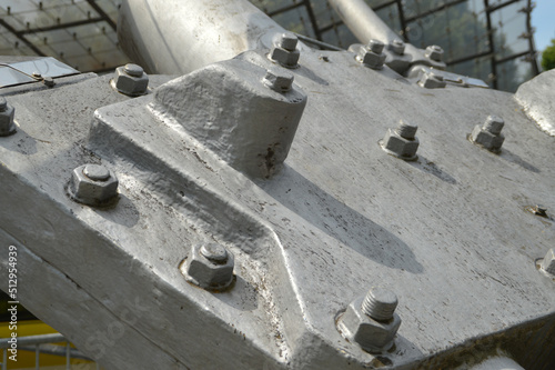 steel plate with screws and nuts