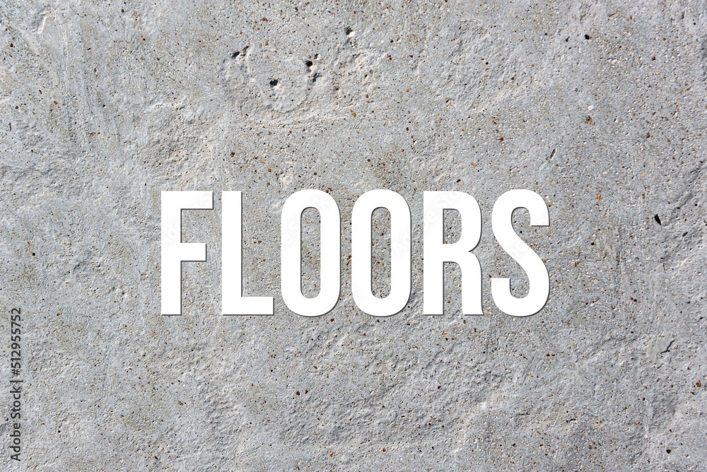 FLOORS - word on concrete background. Cement floor, wall. FLOORS - word on concrete background. Cement floor, wall.