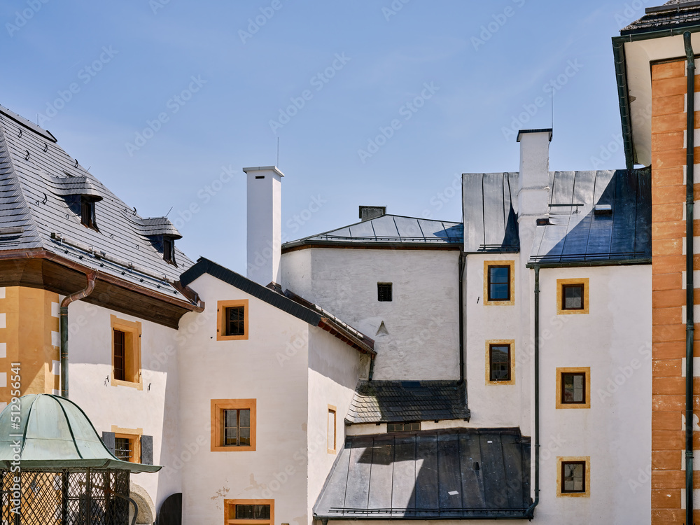 Beautiful facade of the old fortress in Salzburg with windows, Austria