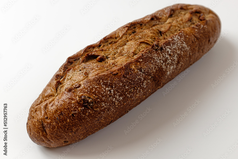 whole grain baguette on a white background whole grain baguette on a white background