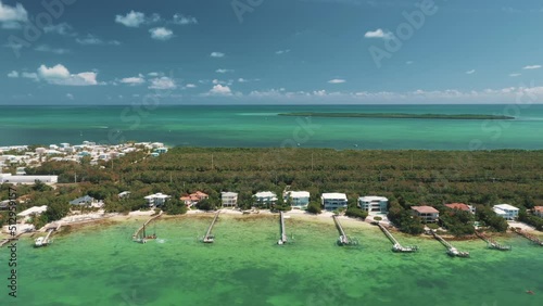 Aerial View Of Coastal Accommodation Buildings In Florida Keys, Florida, USA. drone shot photo