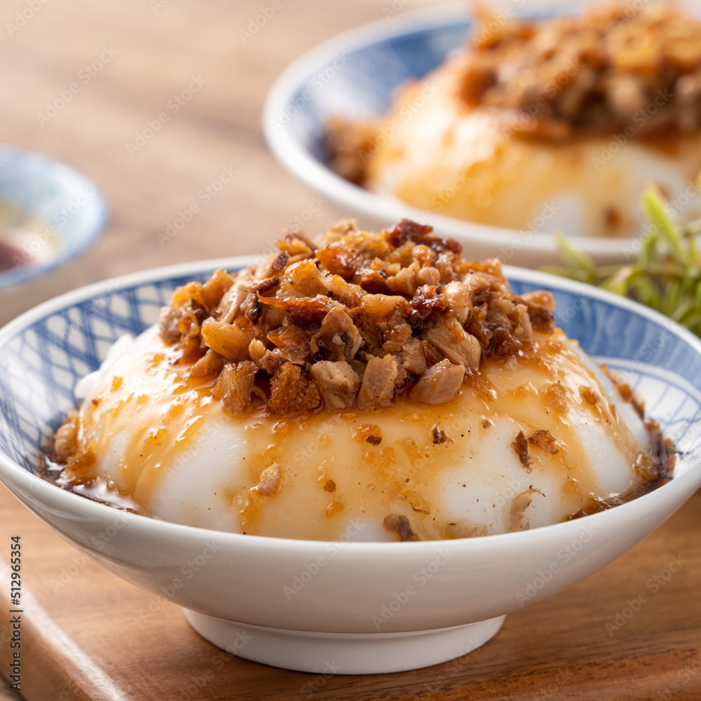 Taiwanese savory rice pudding Wa gui with chopped dried radish and soy sauce Taiwanese savory rice pudding Wa gui with chopped dried radish and soy sauce