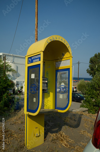 Yellow payphone beach greece rhodos