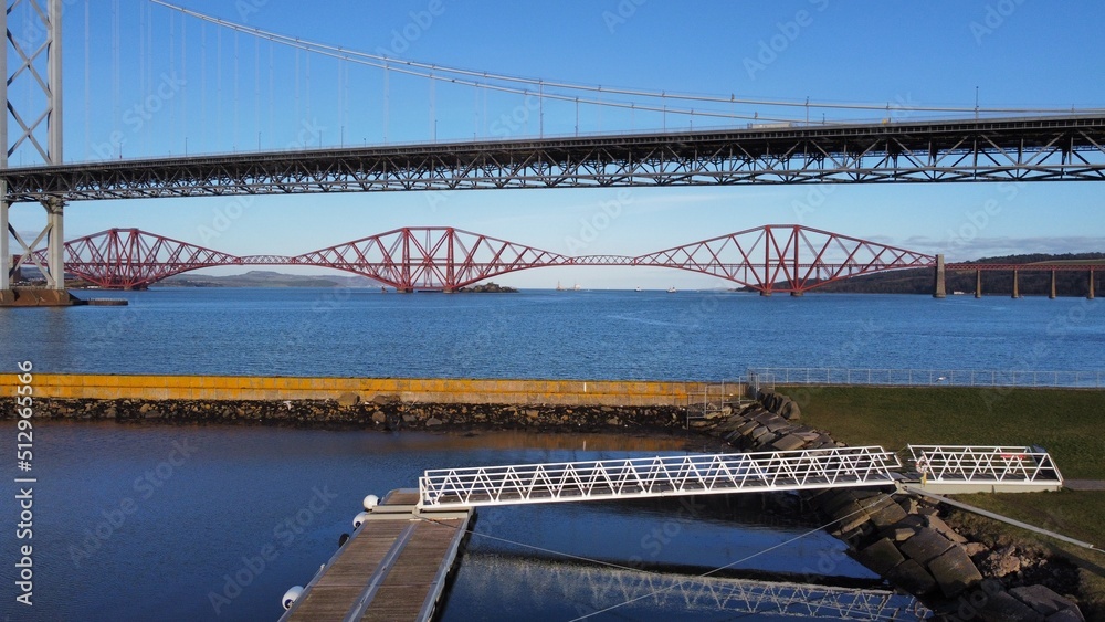 Fototapeta premium Aerial view of bridges crossing the Firth of Forth in Scotland. 