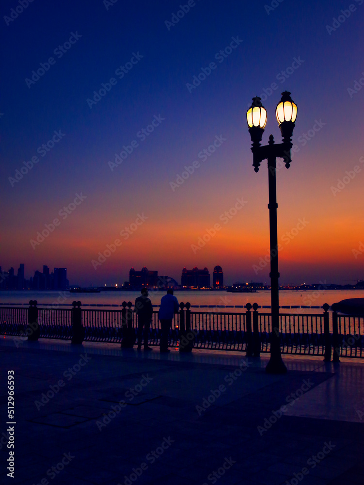 Doha sunset on the pier with colorful sky