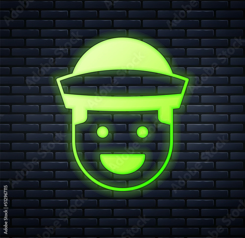 Glowing neon Sailor icon isolated on brick wall background. Vector