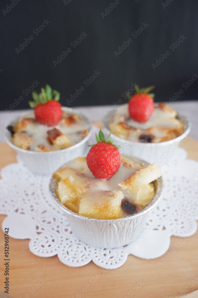 Homemade strawberry shortcake. Strawberry Shortcake Individual Serving Portion on a wooden cutting board. selective focus. close up Homemade strawberry shortcake. Strawberry Shortcake Individual Serving Portion on a wooden cutting board. selective focus. close up