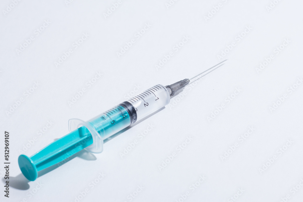 Disposable plastic syringe prepared for injection and vaccination in the hospital. The concept of medicine and health Disposable plastic syringe prepared for injection and vaccination in the hospital. The concept of medicine and health