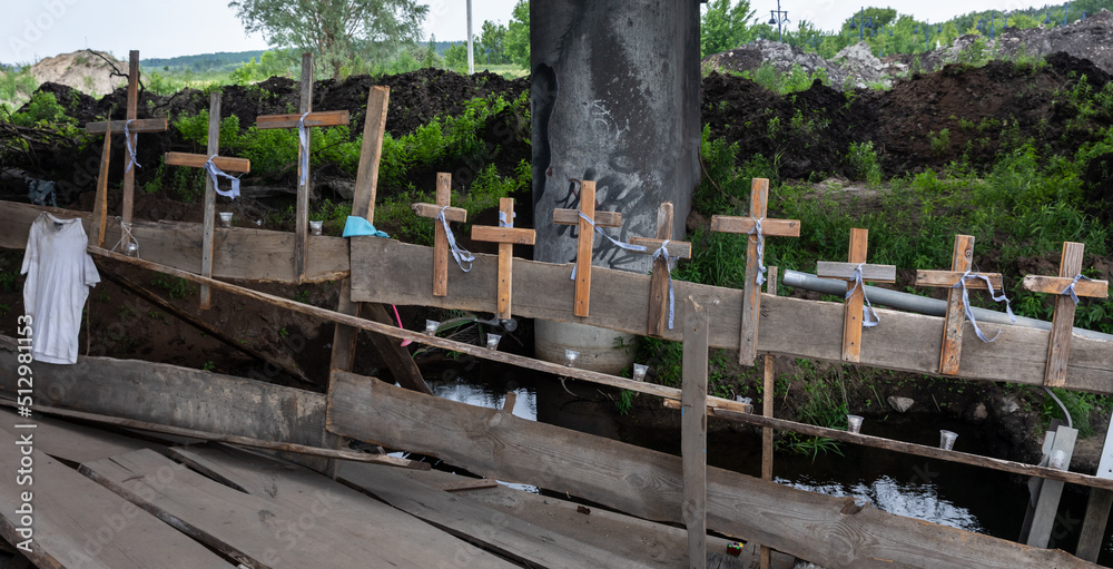War in Ukraine. Crosses on the Irpin bridge