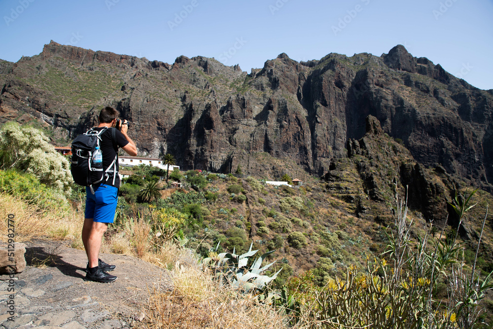man looking at Masca mountain village Tenerife Canary islands