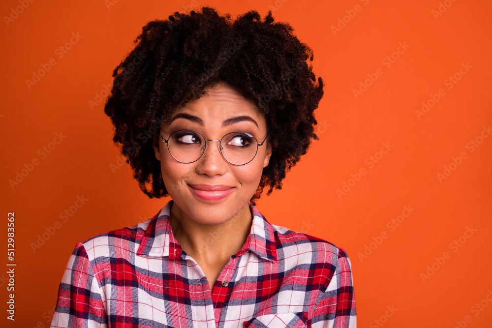 Portrait of shy minded lady decide thoughts future decision wear checkered clothes isolated bright color background Portrait of shy minded lady decide thoughts future decision wear checkered clothes isolated bright color background