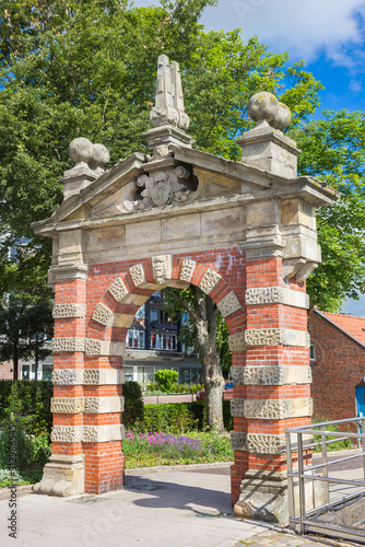 Fotobehang Historic red brick gate in the harbor of Emden, Germany