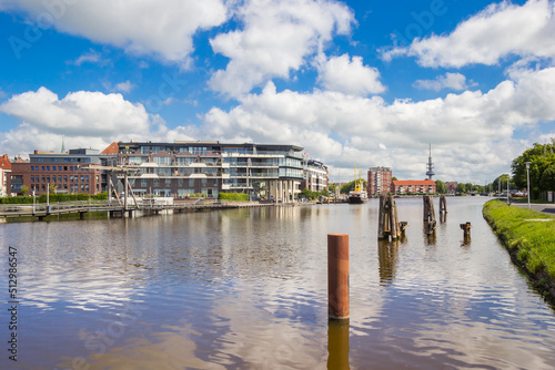Fotografiet Apartment buildings at the waterfront in Emden, Germany