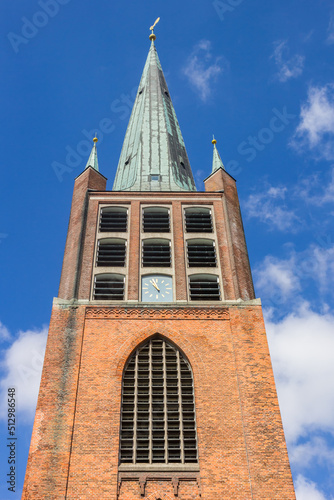Billede på lærred Tower of the historic Schweizer Kirche church in Emden, Germany