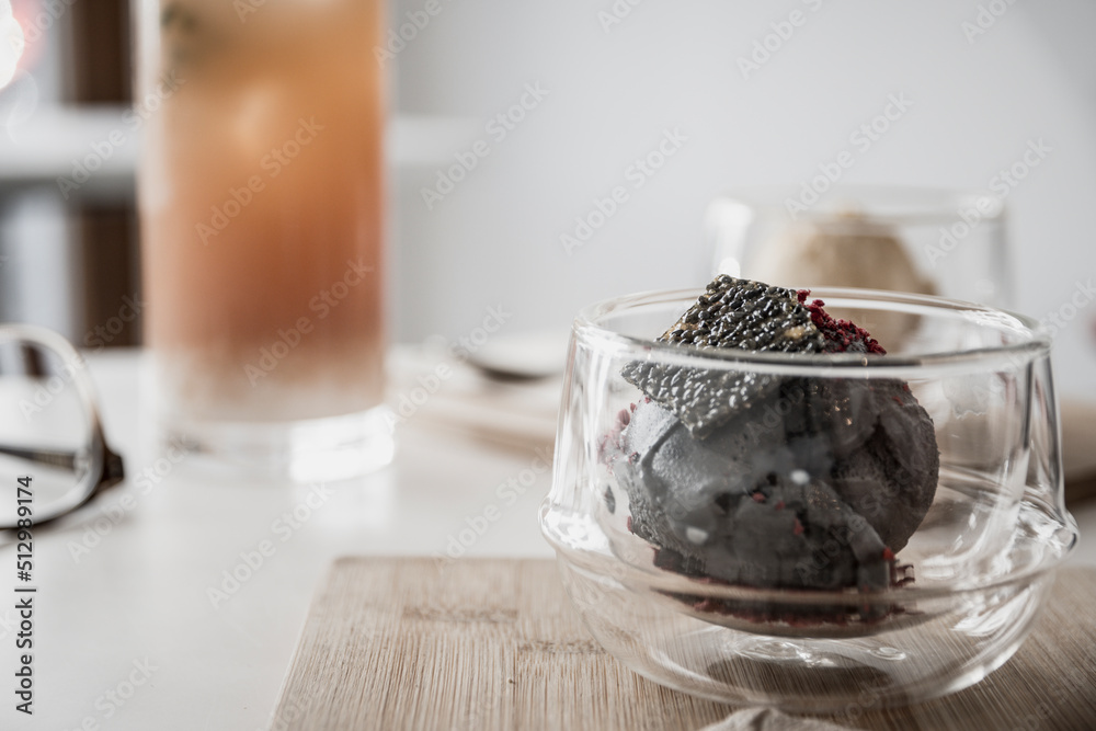 Bowl of tofu based ice cream with black sesame seed. Bowl of tofu based ice cream with black sesame seed.