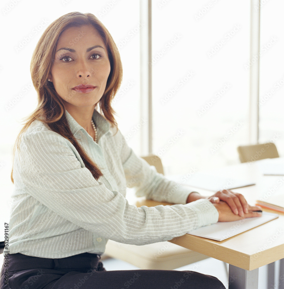 Portrait of female business executive in conference room Portrait of female business executive in conference room