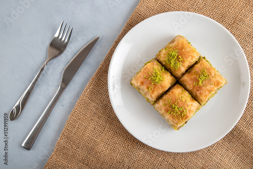 Pistachio baklava on a white plate