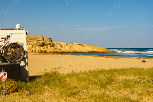 Camper car on beach in Spain. photo
