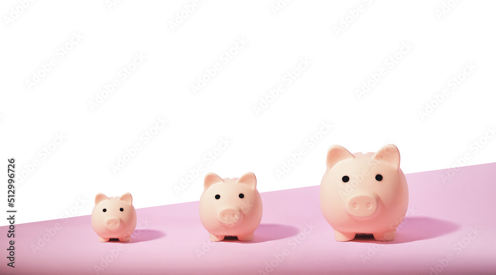 Piggy bank isolated on pink background. Saving money concept. Piggy bank isolated on pink background. Saving money concept.