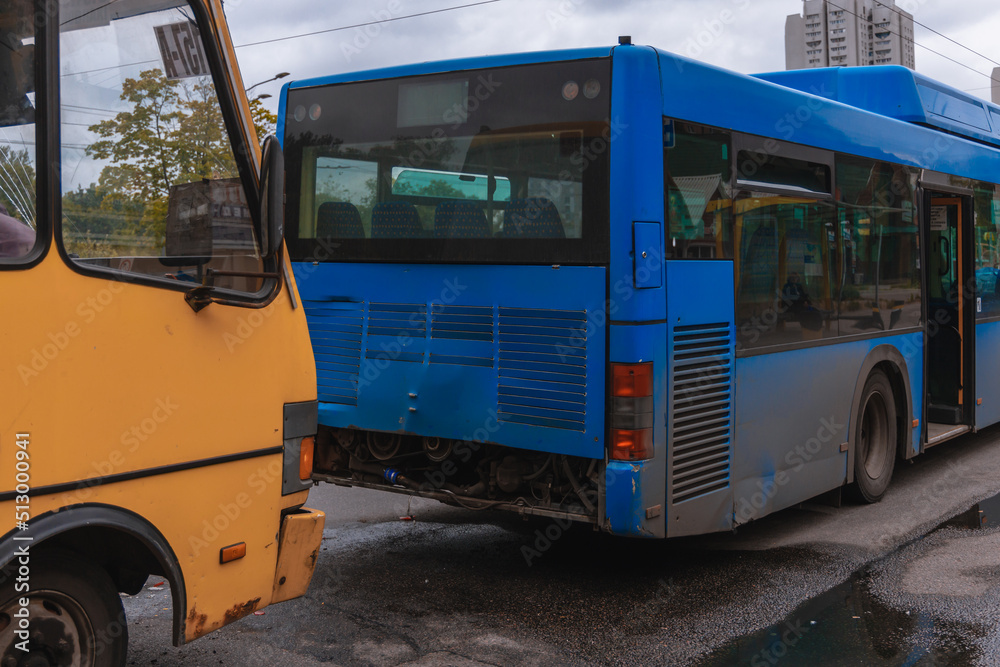 Two buses collided. The concept of careless driving. Broken windshield. Traffic accidents on the road. Failure to maintain a safe distance on the road