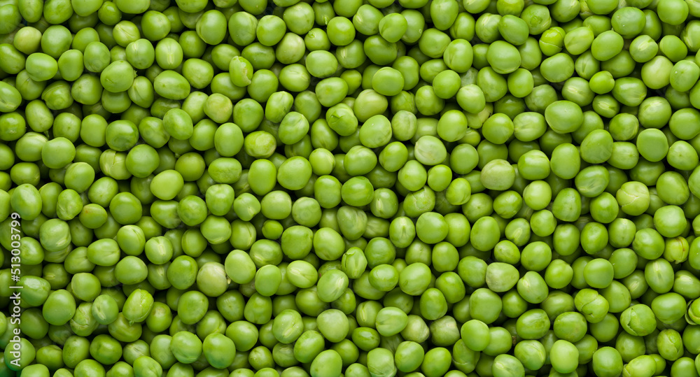 Green peas top view. Food background. Pea pods from farmland. Pea was freshly picked. Organic fresh vegetables. healthy eating. Green peas top view. Food background. Pea pods from farmland. Pea was freshly picked. Organic fresh vegetables. healthy eating.