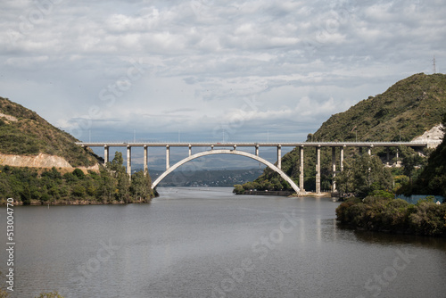 View over the San Roque Dam of Lake San Roque in Córdoba, in the background the bridge 