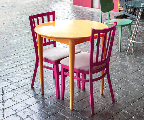 Table and chairs in front of the restaurant 