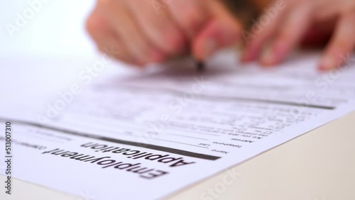 Wallpaper Mural hand of young man fills out the application form for employment Torontodigital.ca