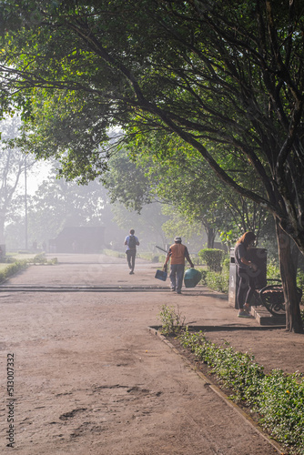 Defocused photo of People walking in front of Borobudur temple during morning